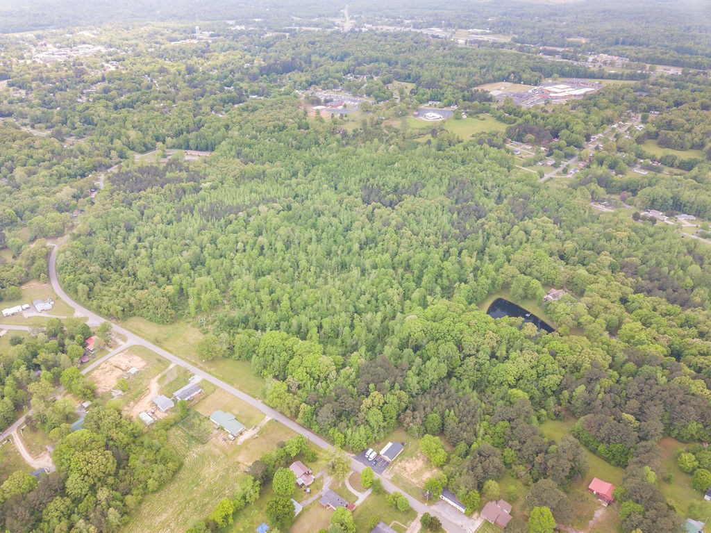 876 Flatwoods Road Camden, TN 38320 - Photo 10 of 47 a view of a field with an outdoor space