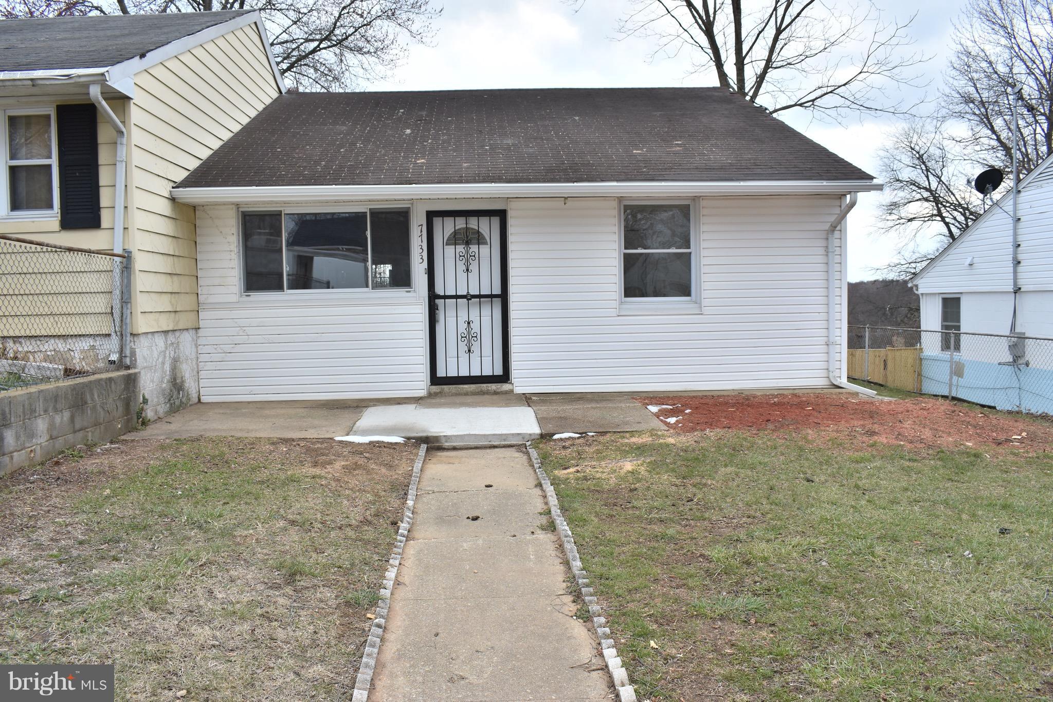 7733 Oxman Road Landover, MD 20785 - Photo 1 of 19 a front view of house with yard