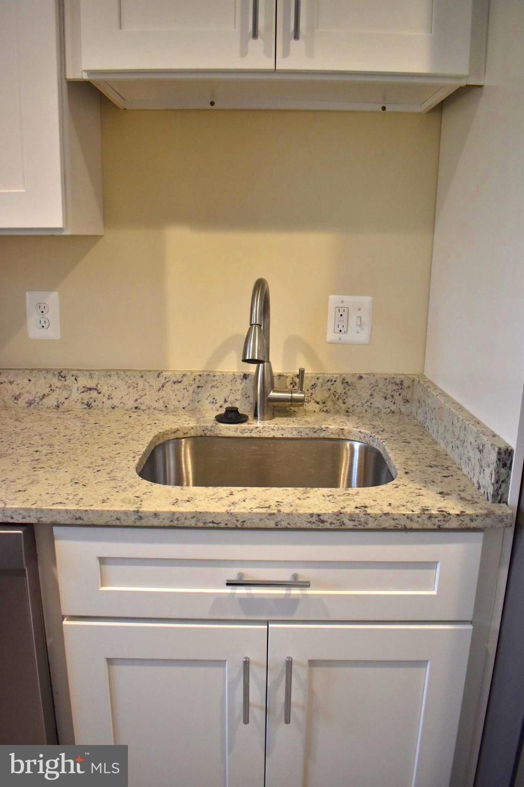 7733 Oxman Road Landover, MD 20785 - Photo 14 of 19 a close view of sink and tap