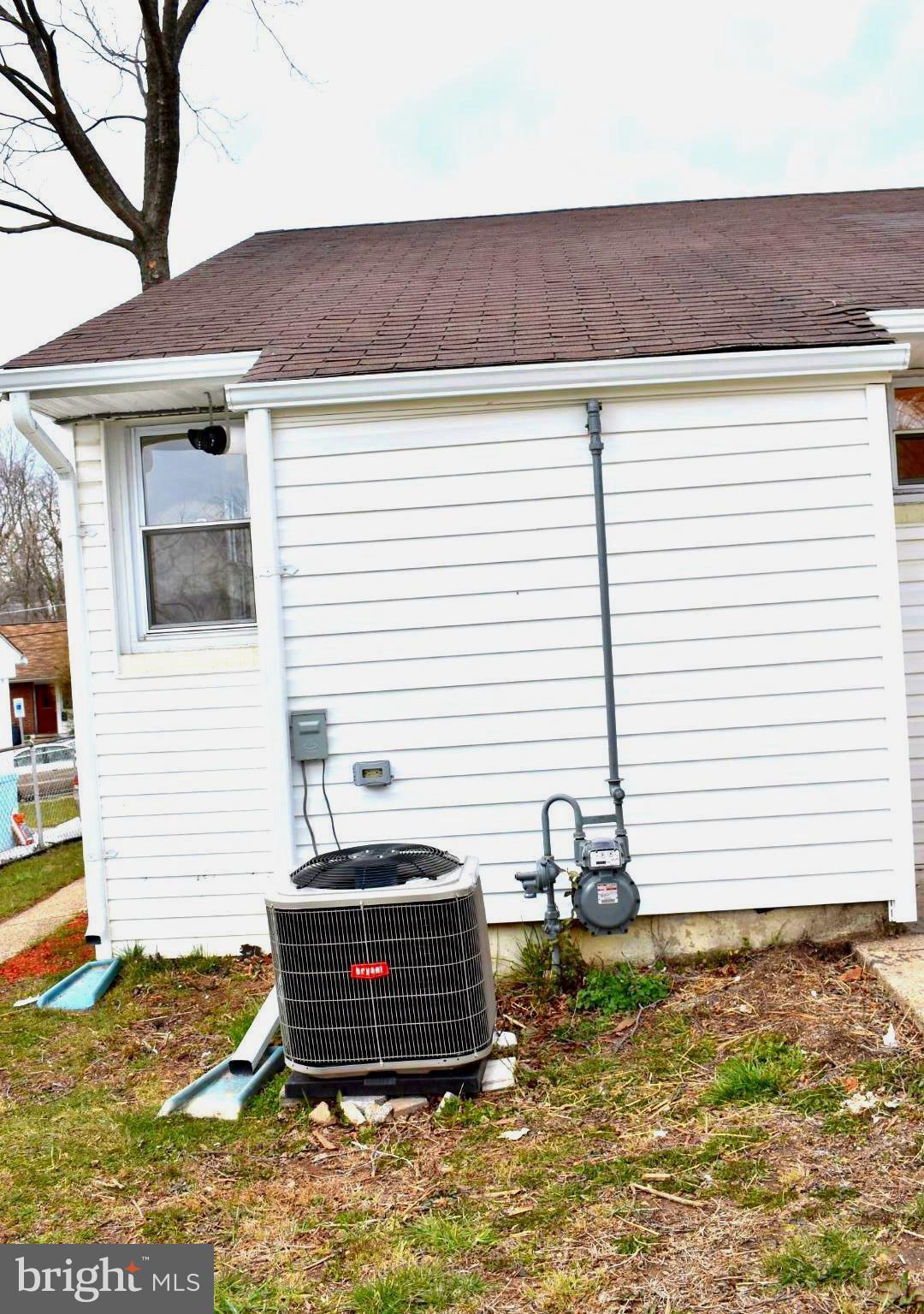 7733 Oxman Road Landover, MD 20785 - Photo 19 of 19 a side view of a house with a yard