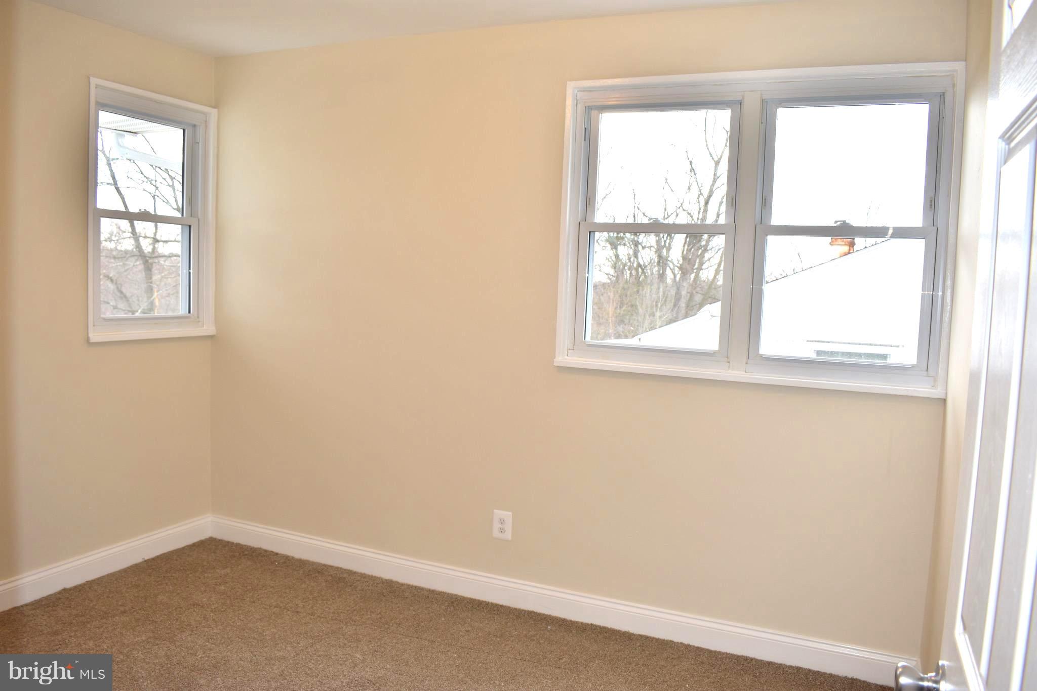 7733 Oxman Road Landover, MD 20785 - Photo 8 of 19 an empty room with a window