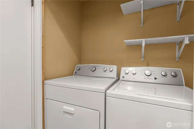 a utility room with dryer and washer
