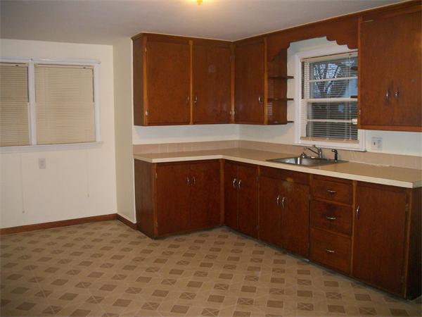 190 East Street Springfield, MA 01104 - Photo 2 of 5 a kitchen with a sink and a cabinets