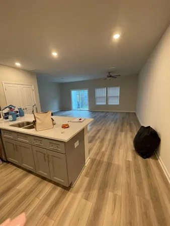 a view of empty room with windows