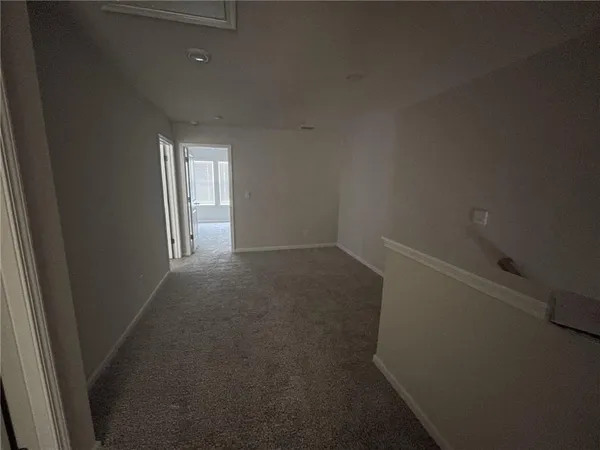 a view of small space with racks on the wall