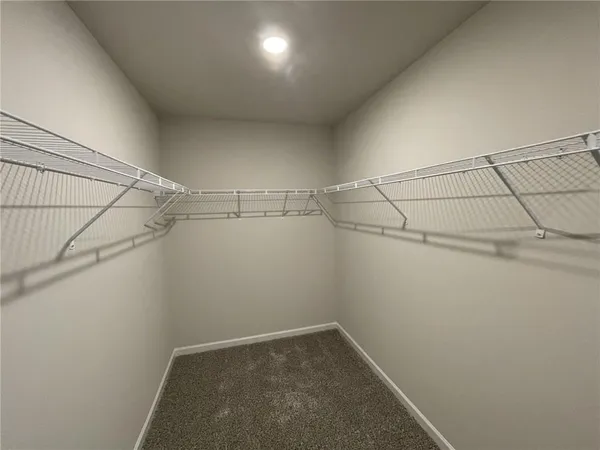 a bathroom with a double vanity sink a and mirror