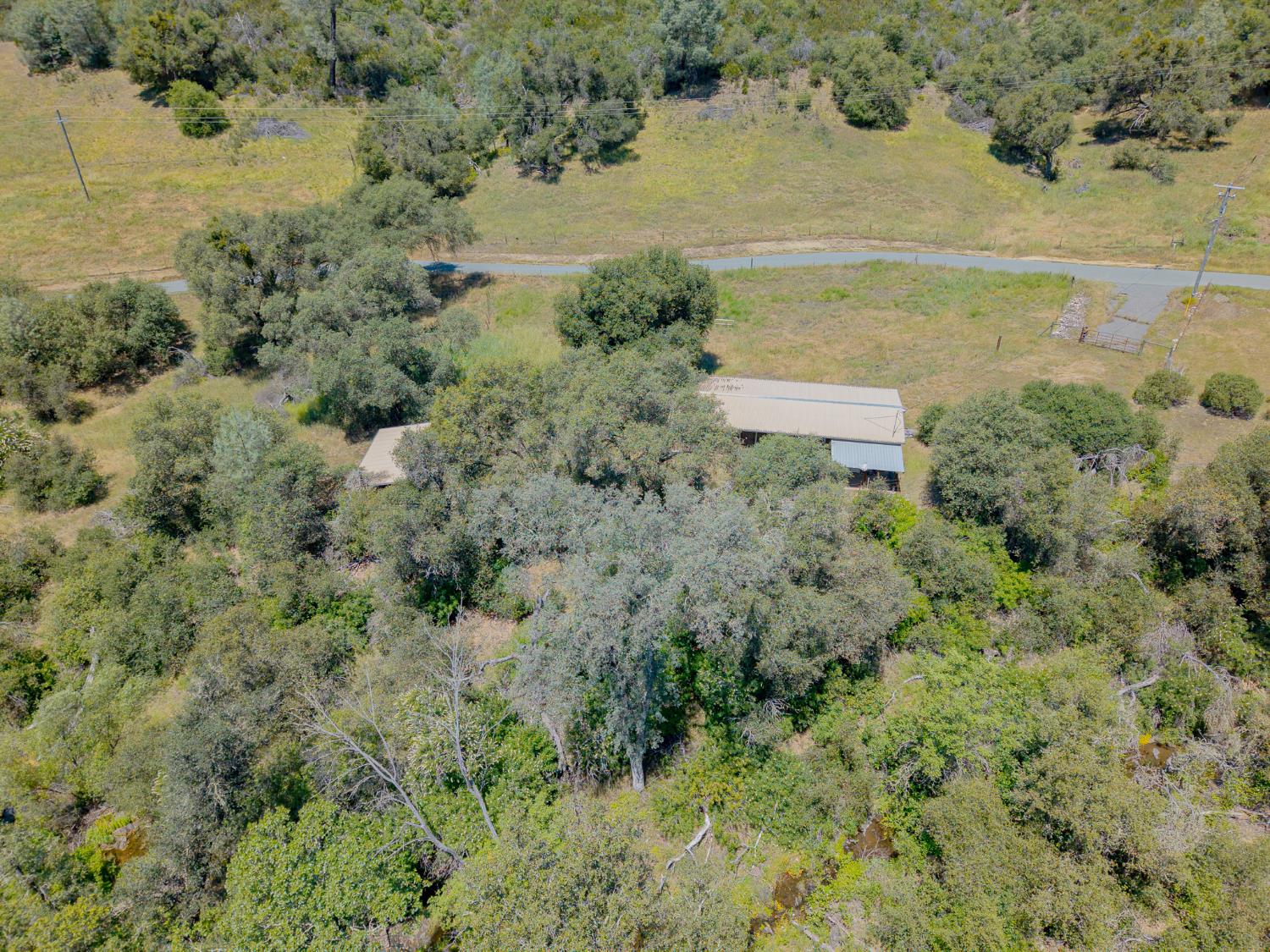 5912 Old Gulch Road San Andreas, CA 95249 - Photo 70 of 71 a view of a lake with a mountain