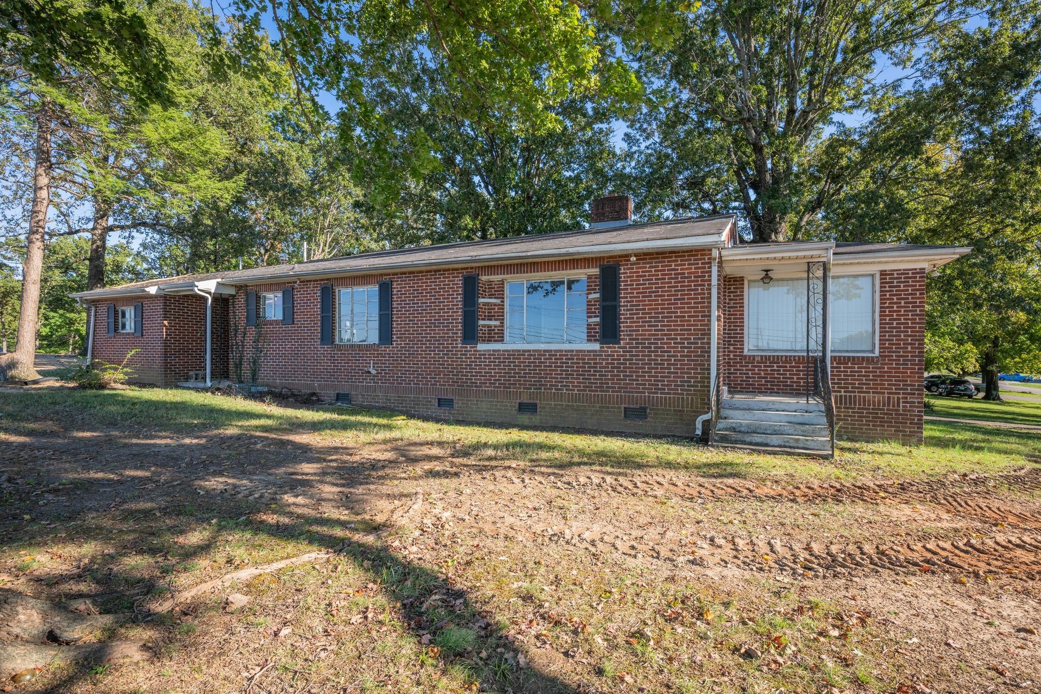 101 Sunset Road Dickson, TN 37055 - Photo 3 of 8 a view of a house with a yard and garage