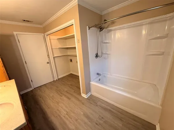 a view of an empty walk in closet