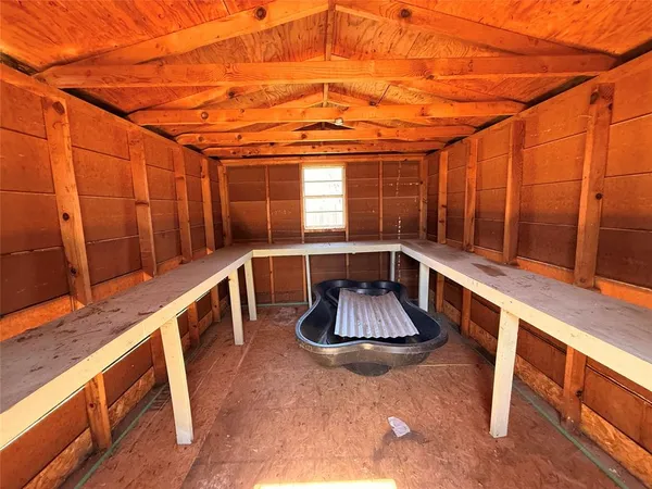 a swimming pool with wooden fence