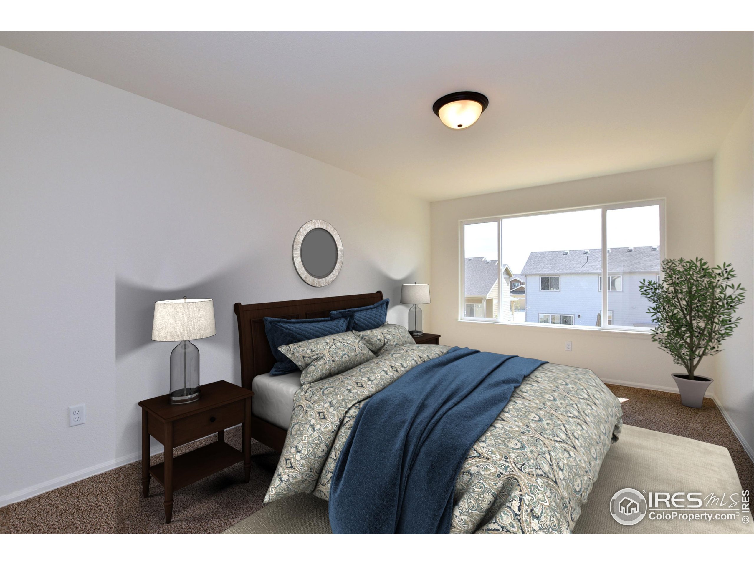 620 87th Avenue Greeley, CO 80634 - Photo 7 of 39 a bed room with a bed and a window