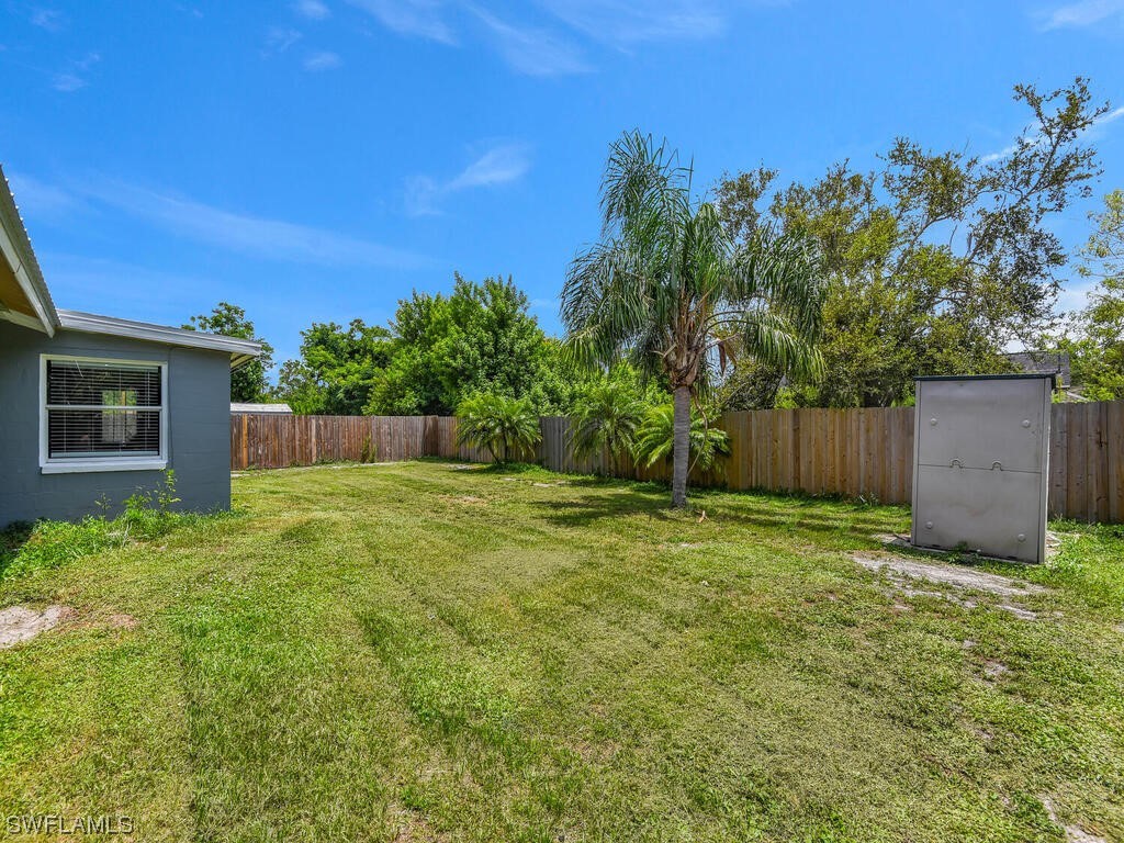 26499 Eager Road Punta Gorda, FL 33955 - Photo 21 of 21 front view of a house with a yard
