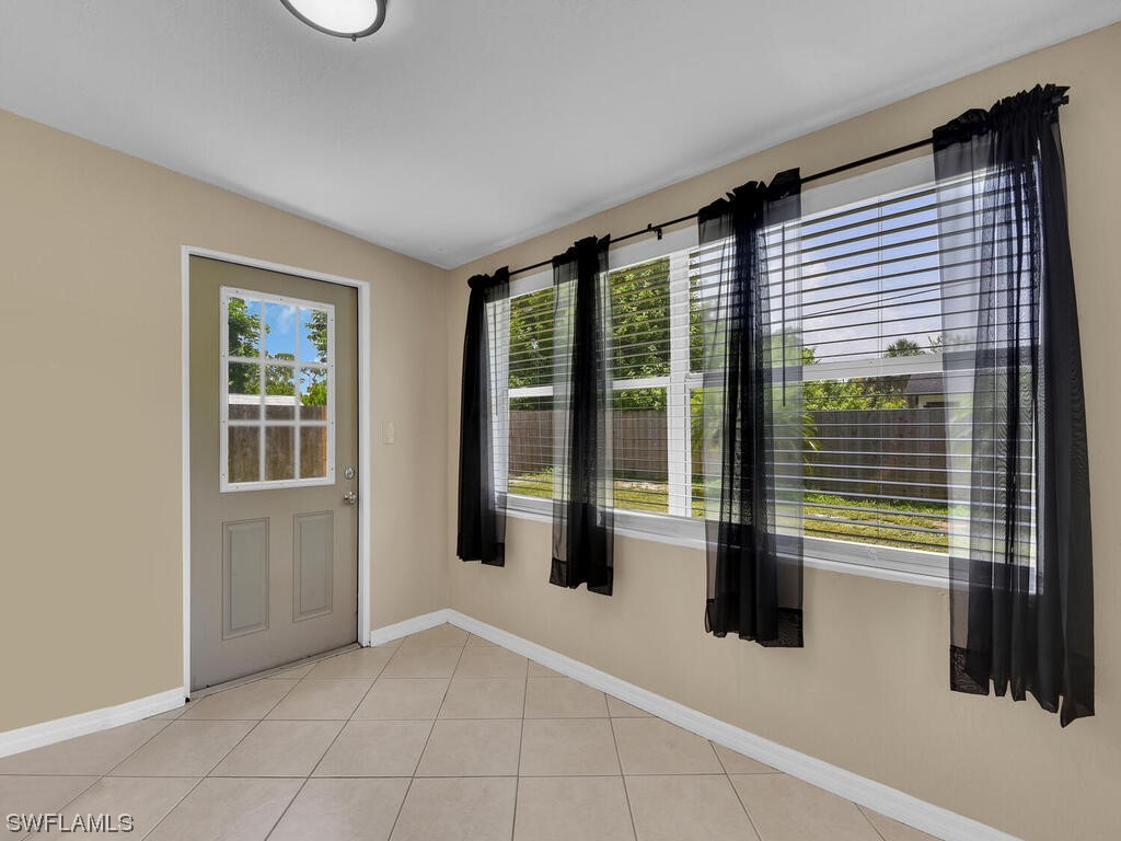 26499 Eager Road Punta Gorda, FL 33955 - Photo 8 of 21 a view of livingroom with furniture and large window