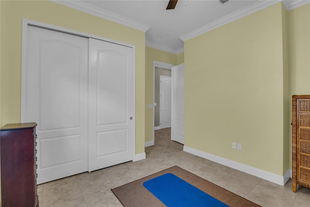 2665 Meadowedge Loop St. Cloud, FL 34772 - Photo 41 of 53 a view of room with hardwood floor and cabinet