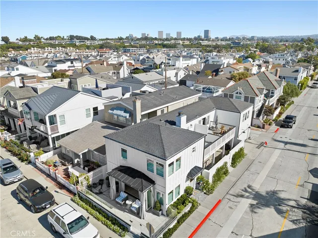 an aerial view of a house with a mountain view