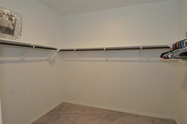 a bathroom with a sink vanity and a mirror
