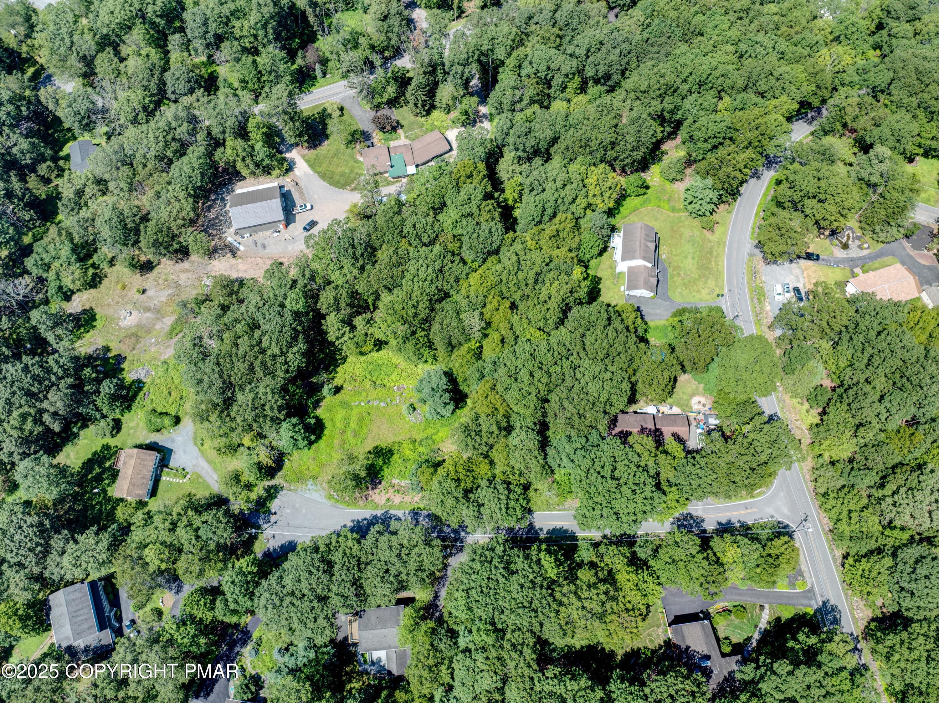 85 Birch Road Swiftwater, PA 18370 - Photo 3 of 7 an aerial view of residential house with outdoor space and trees all around