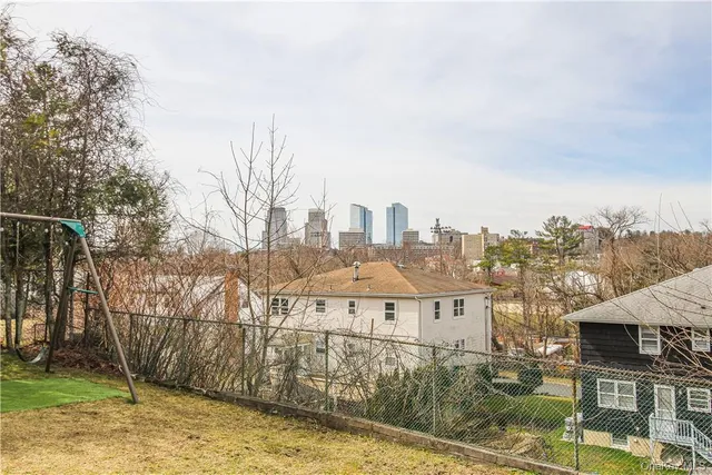 a view of a city with tall buildings