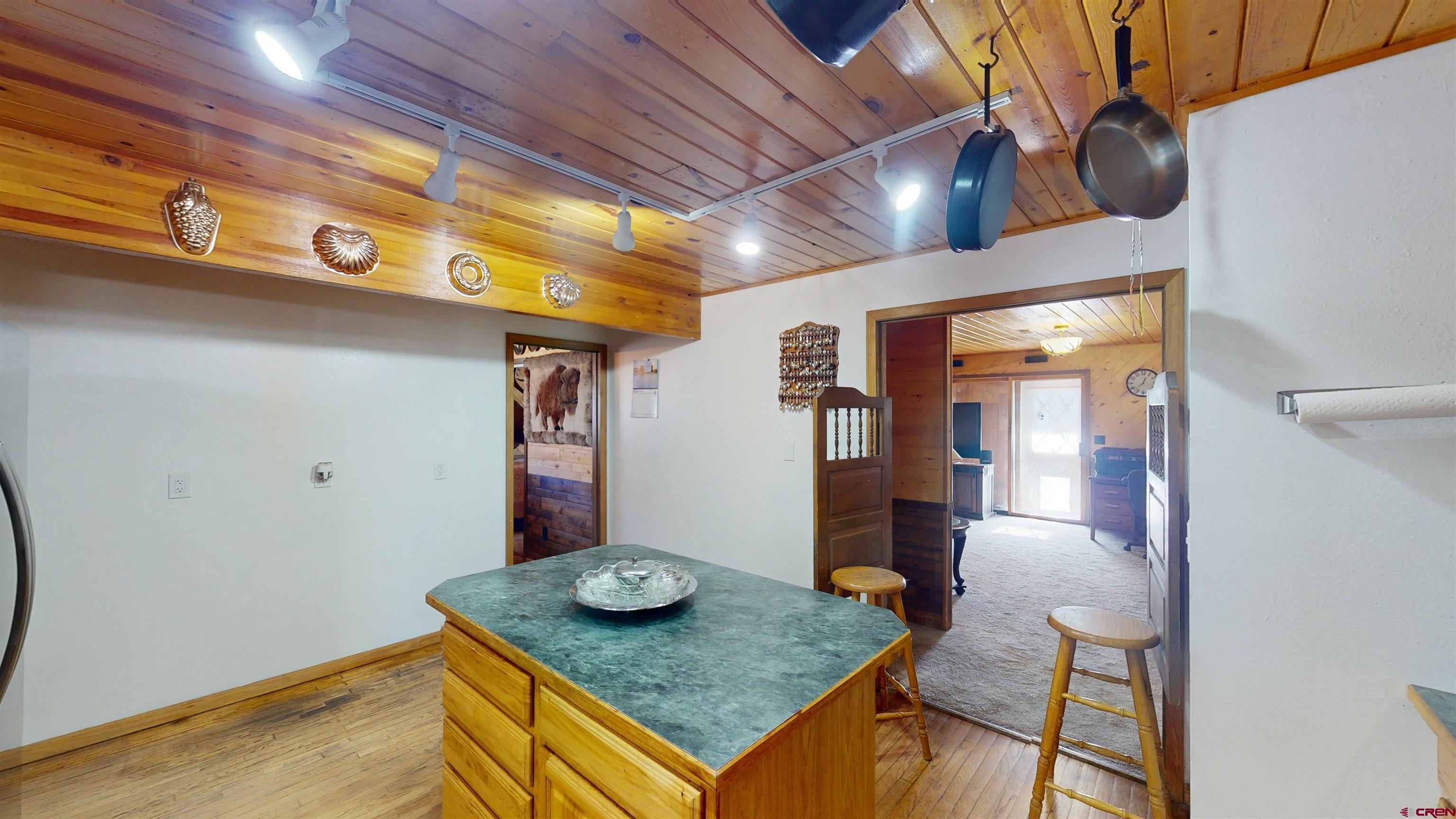 19253 Stevens Gulch Road Paonia, CO 81428 - Photo 23 of 43 a kitchen with stainless steel appliances granite countertop a sink and a counter space