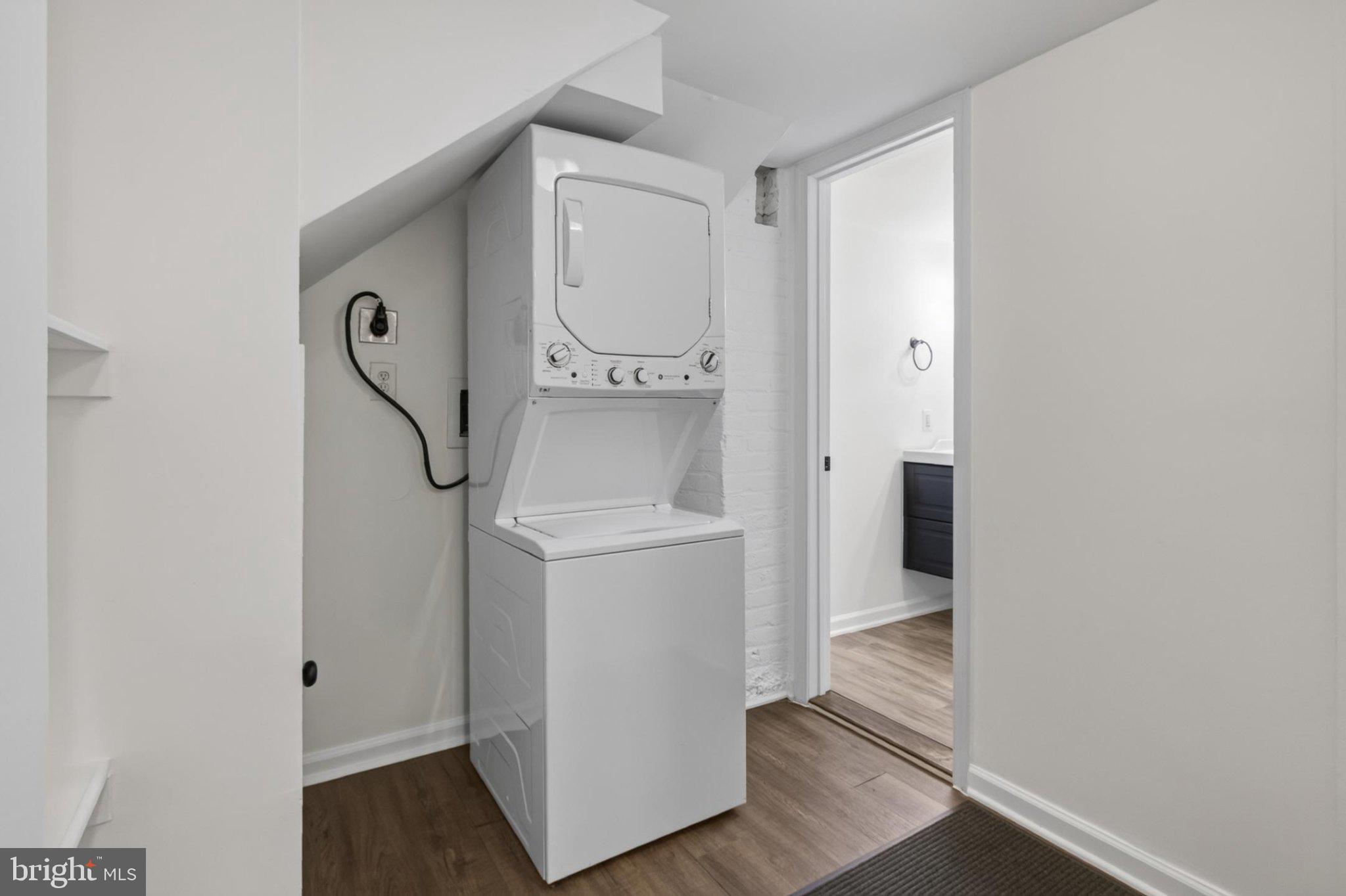738 11th Street Northeast, Unit 3 Washington, DC 20002 - Photo 19 of 29 Efficient laundry space in modern home.