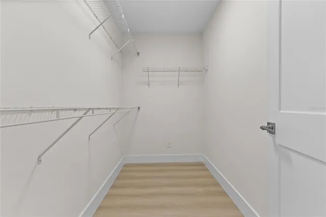 a view of a room with racks on the wall