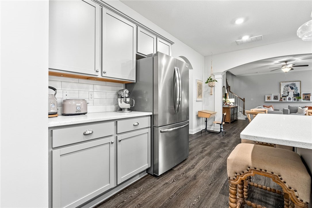 1883 Waterfall Road Auburn, AL 36830 - Photo 14 of 37 The kitchen also features a coffee bar and appliance counter with cabinets for extra storage