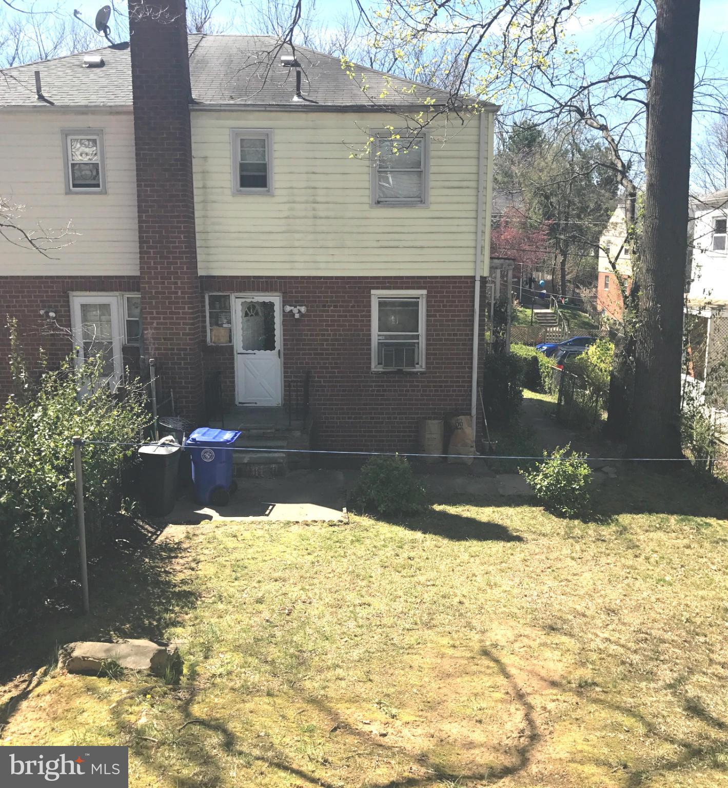 12055 Claridge Road Silver Spring, MD 20902 - Photo 10 of 10 a view of a house with a yard