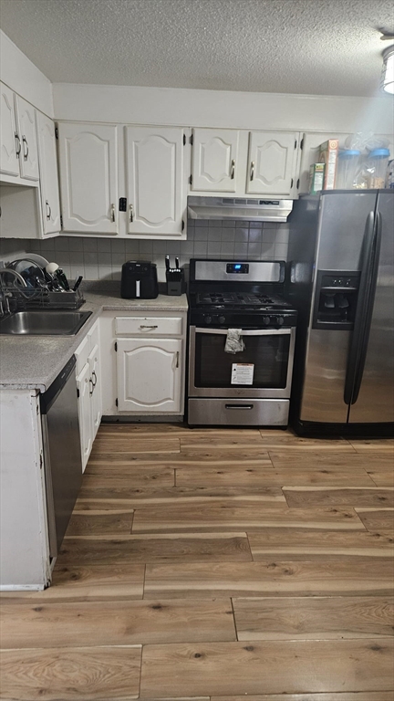 24 Inman Street, Unit 6 Lawrence, MA 01843 - Photo 2 of 6