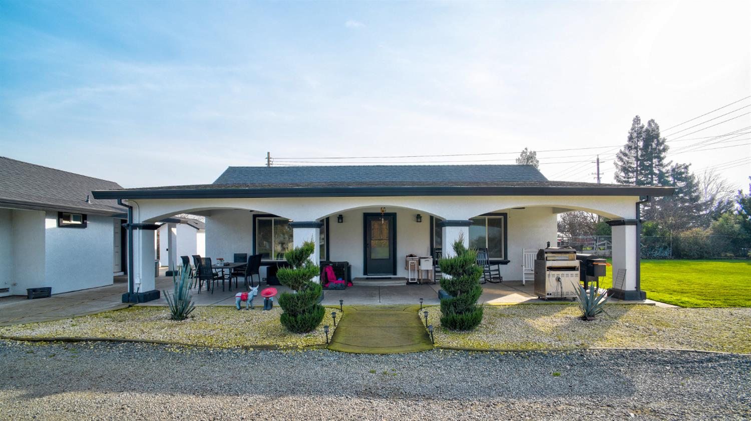 8567 Bradshaw Road Elk Grove, CA 95624 - Photo 1 of 12 a view of a house with a entryway