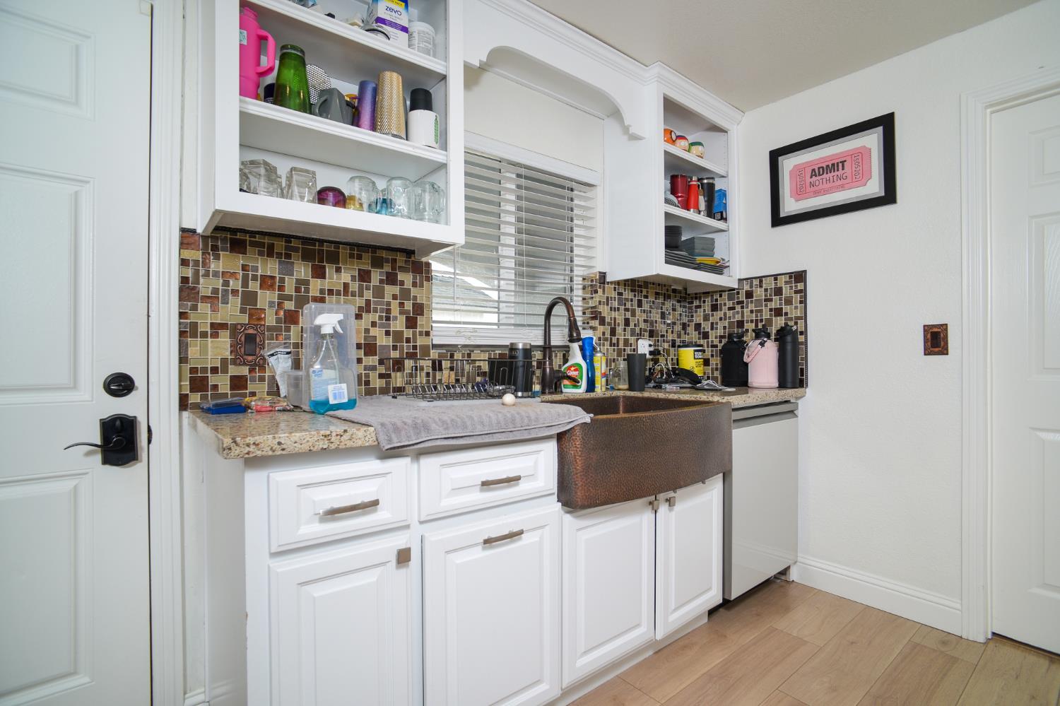 8567 Bradshaw Road Elk Grove, CA 95624 - Photo 3 of 12 a kitchen with stainless steel appliances granite countertop cabinets and a potted plant
