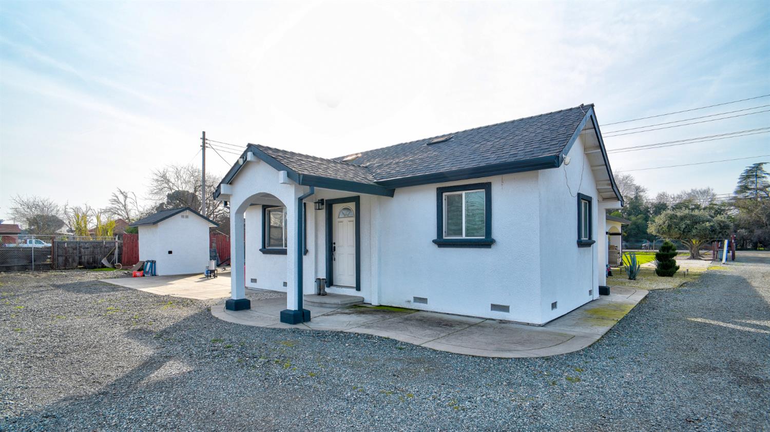8567 Bradshaw Road Elk Grove, CA 95624 - Photo 5 of 12 a view of a house with a yard