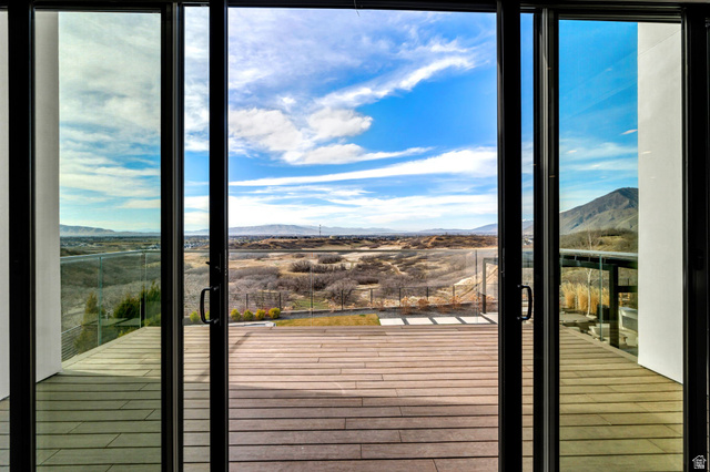 3918 South Mapleton Ests Drive Mapleton, UT 84664 - Photo 8 of 103 Doorway to outside featuring a mountain view