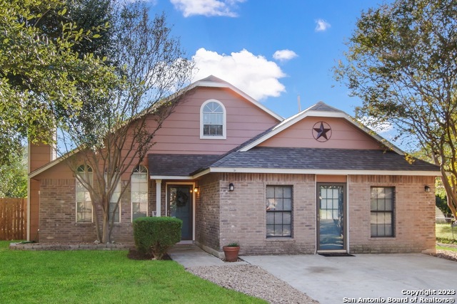 2514 Moss Bluff San Antonio, TX 78232 - Photo 1 of 1 a front view of a house with a garden and yard