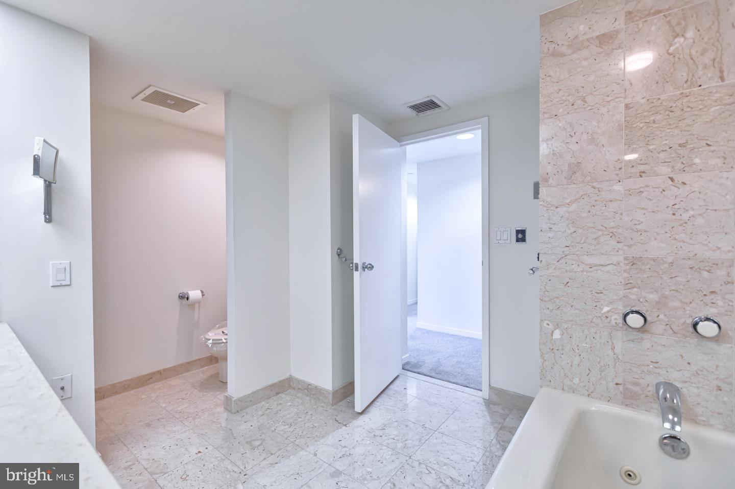 202-10 West Rittenhouse Square, Unit 1705 Philadelphia, PA 19103 - Photo 14 of 28 a bathroom with a bathtub and a sink