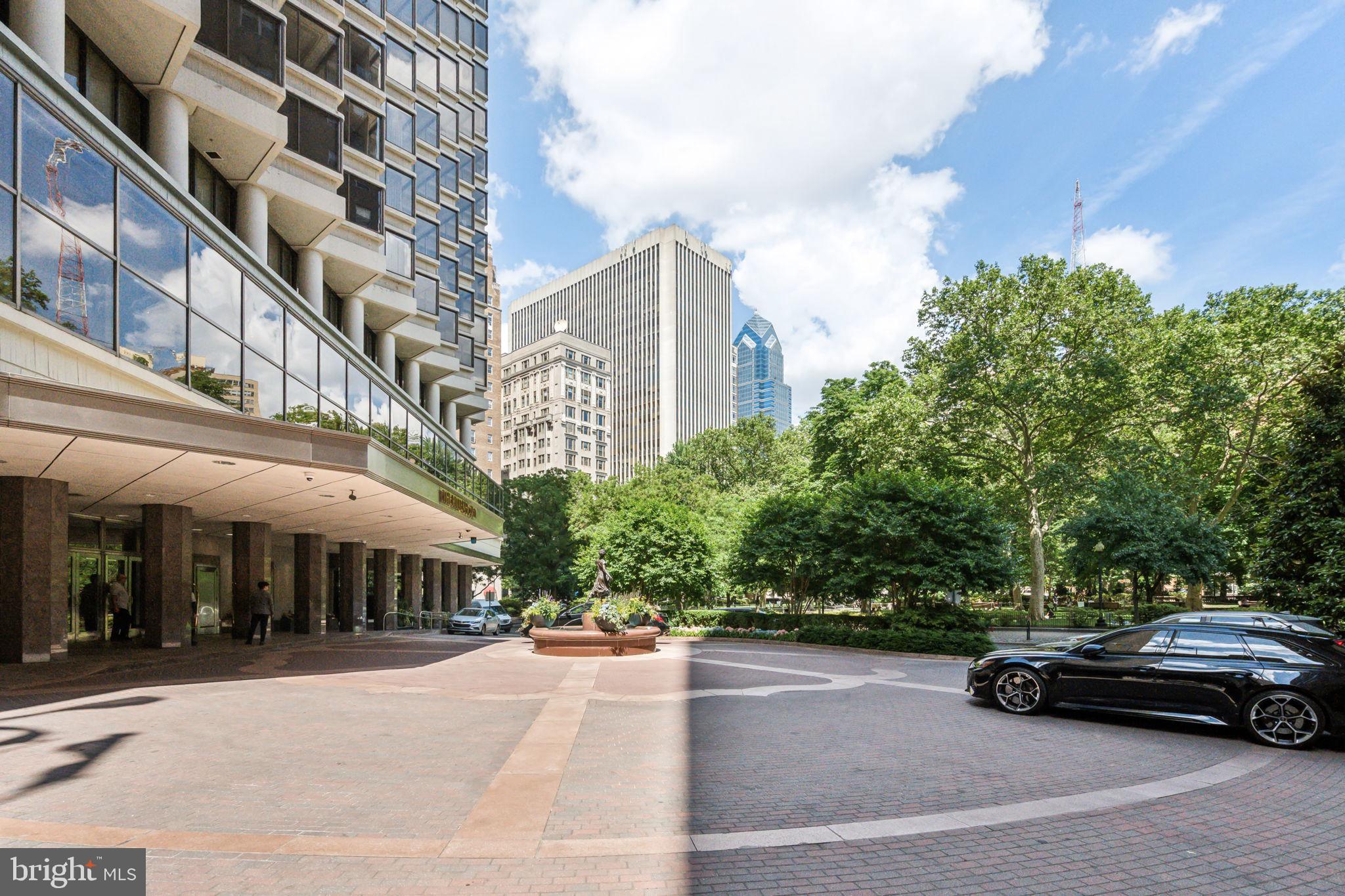 202-10 West Rittenhouse Square, Unit 1705 Philadelphia, PA 19103 - Photo 28 of 28 a car parked in front of a building