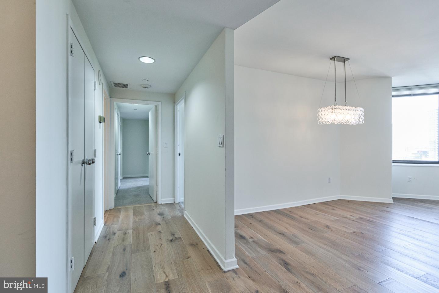 202-10 West Rittenhouse Square, Unit 1705 Philadelphia, PA 19103 - Photo 5 of 28 a view of a room with wooden floor and window