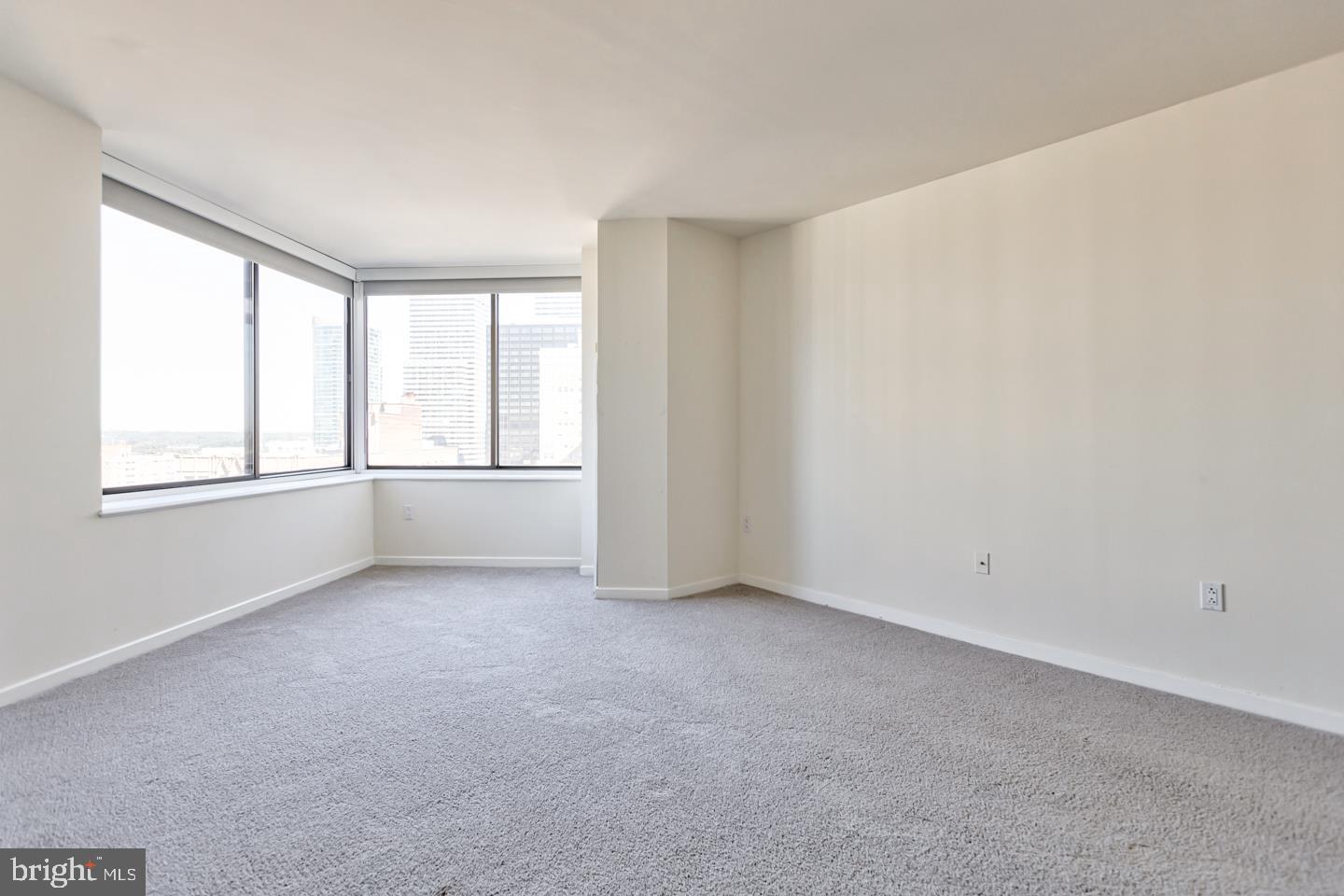 202-10 West Rittenhouse Square, Unit 1705 Philadelphia, PA 19103 - Photo 7 of 28 an empty room with windows