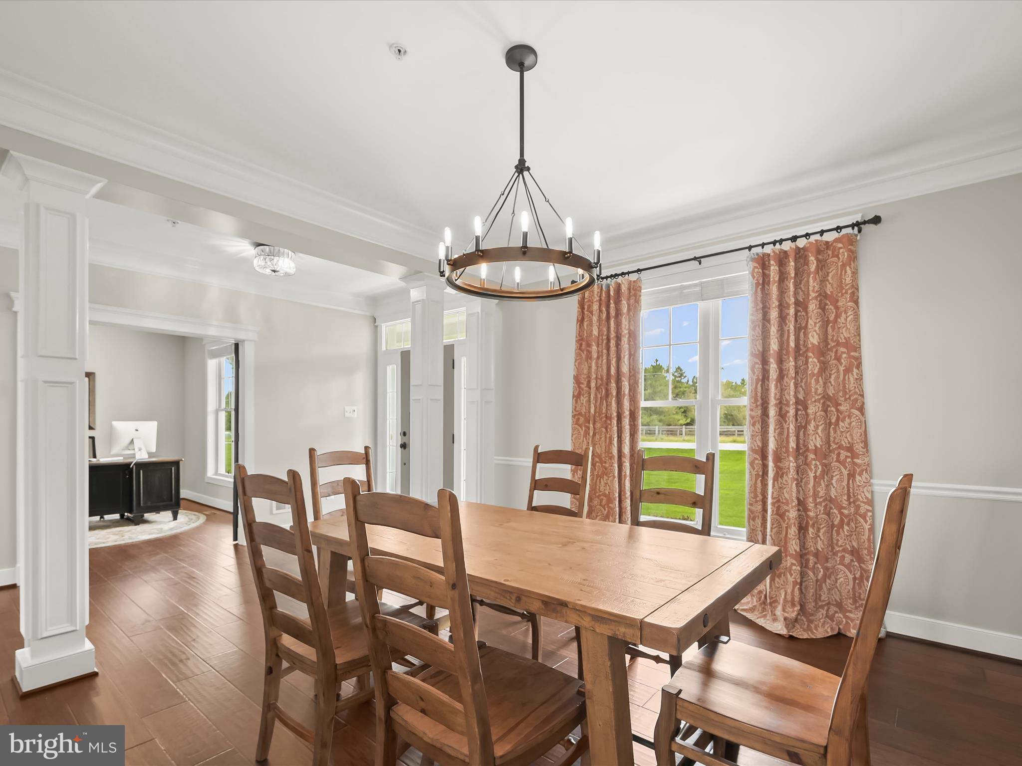 17263 Hardy Road Mount Airy, MD 21771 - Photo 14 of 98 a view of a dining room with furniture window and wooden floor