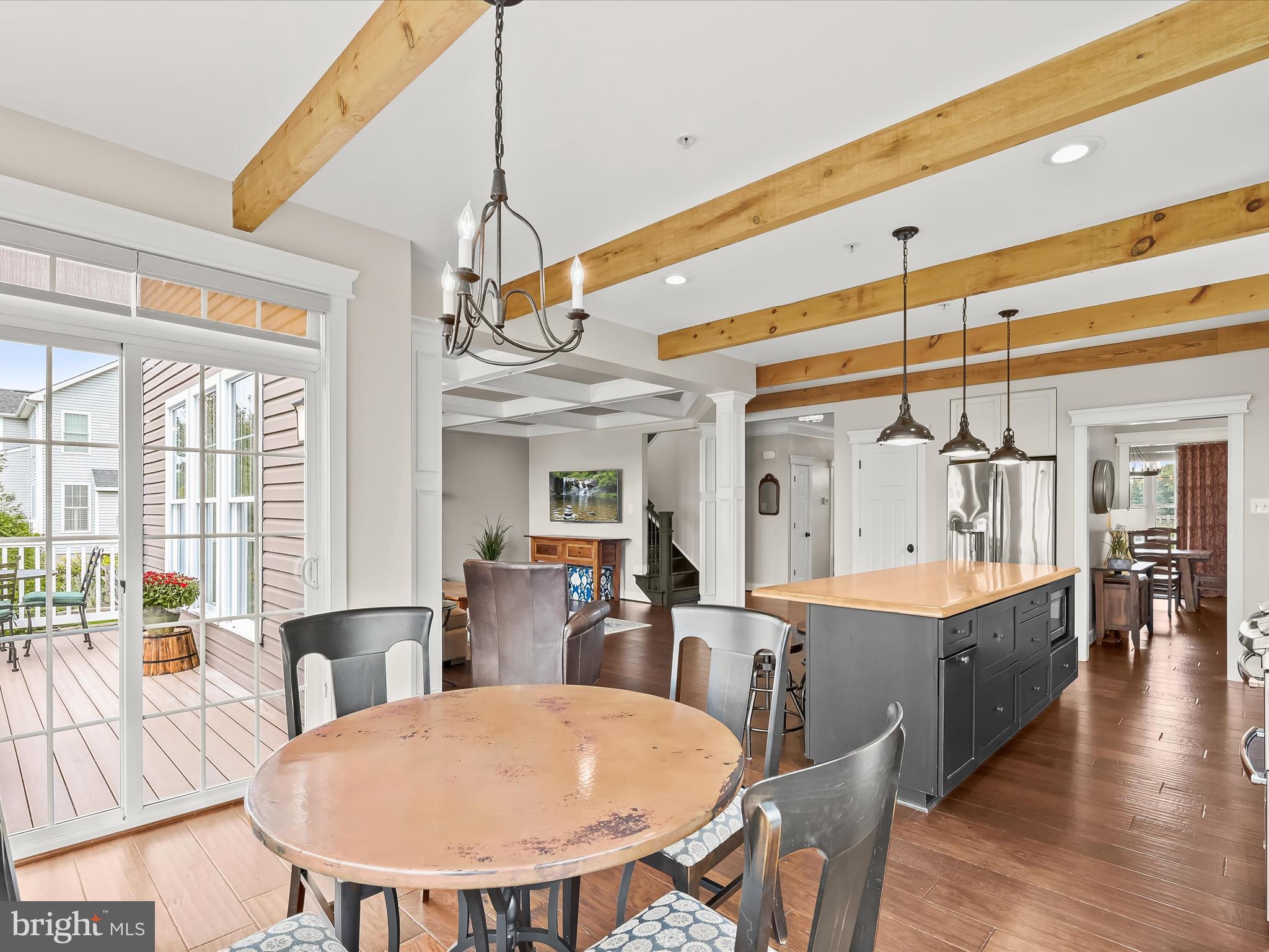 17263 Hardy Road Mount Airy, MD 21771 - Photo 26 of 98 a view of a dining room with furniture wooden floor and chandelier