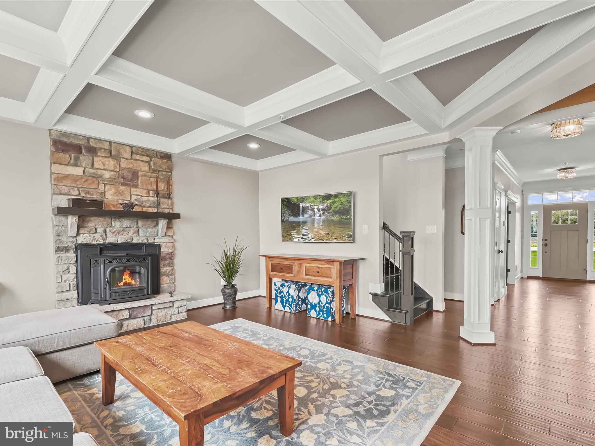 17263 Hardy Road Mount Airy, MD 21771 - Photo 33 of 98 a living room with furniture a fireplace and a table