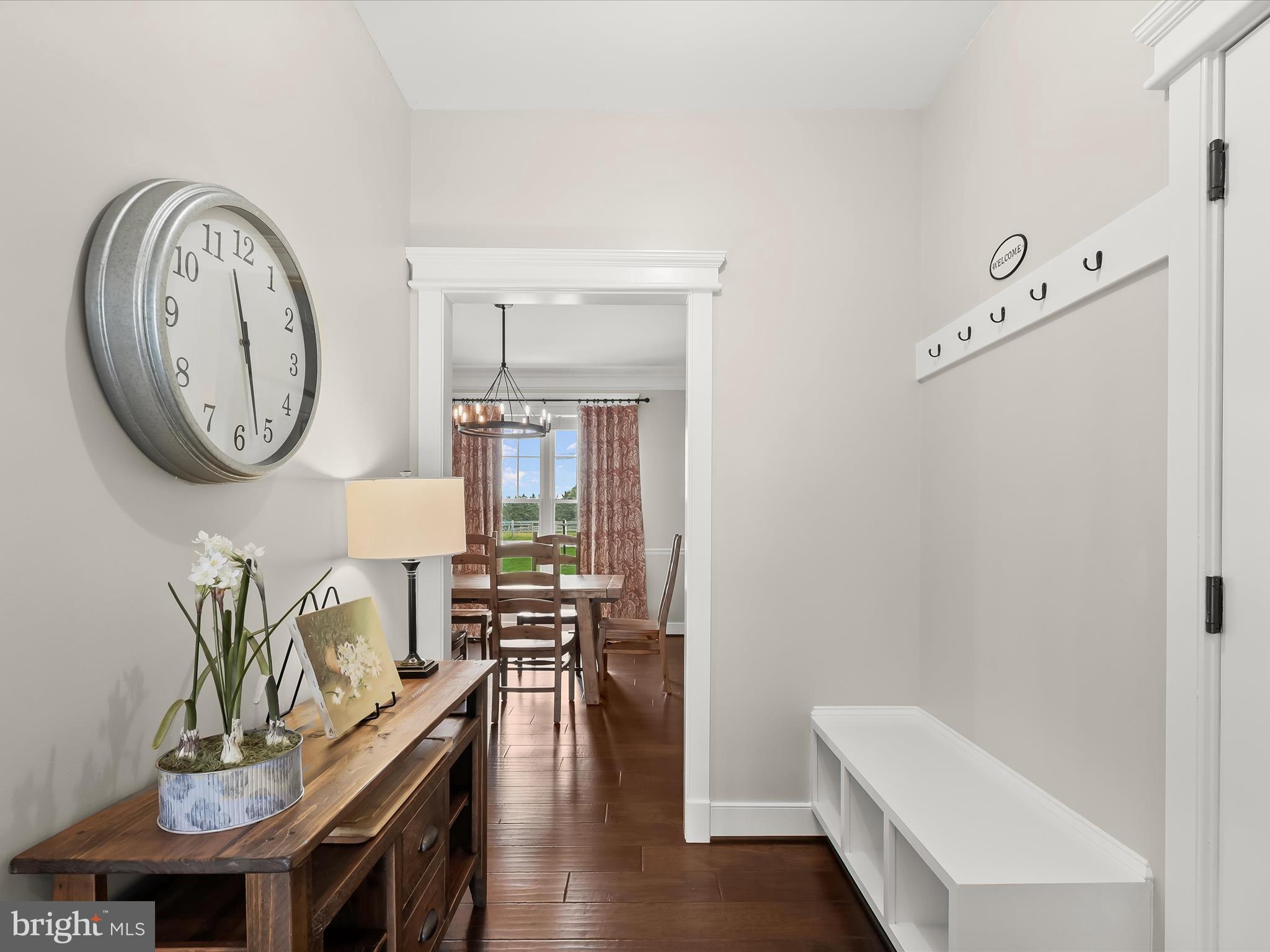 17263 Hardy Road Mount Airy, MD 21771 - Photo 35 of 98 a view of a dining room with furniture and wooden floor