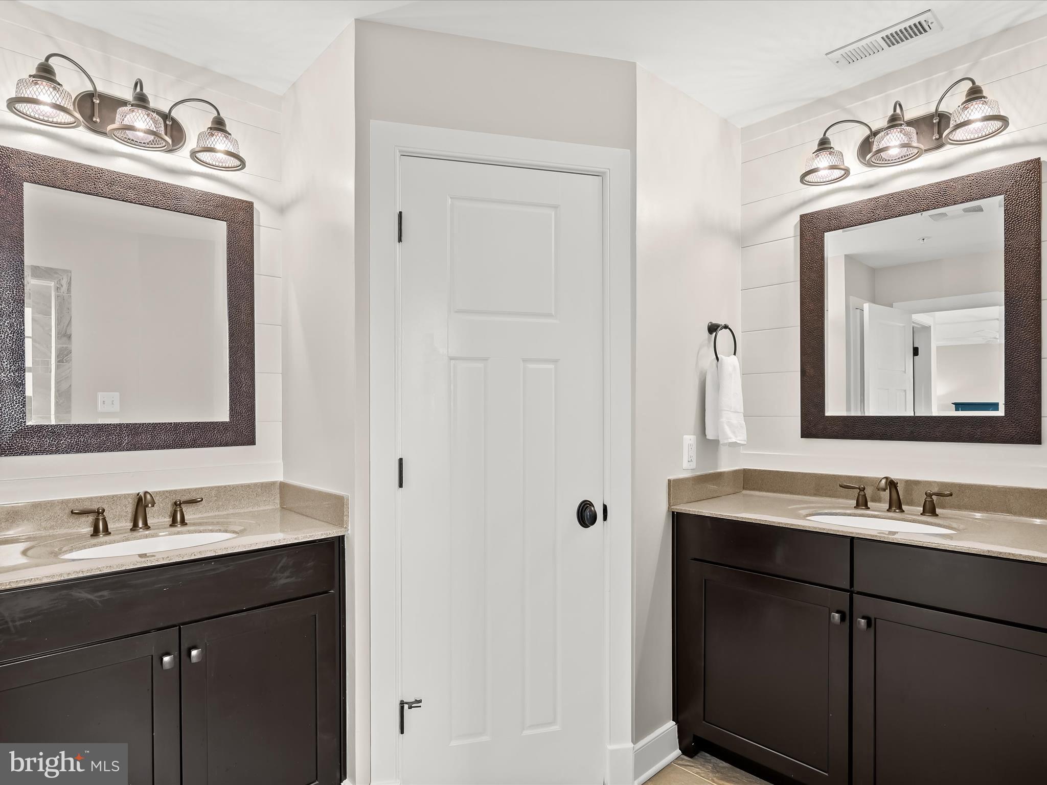 17263 Hardy Road Mount Airy, MD 21771 - Photo 45 of 98 a bathroom with a sink vanity and a mirror