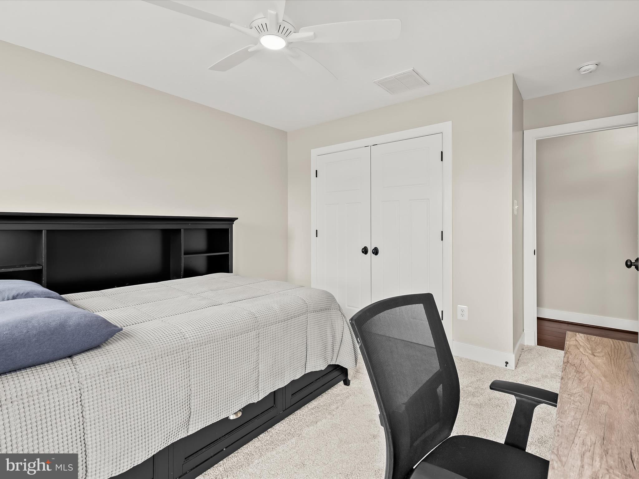 17263 Hardy Road Mount Airy, MD 21771 - Photo 50 of 98 a bedroom with a bed and a dresser