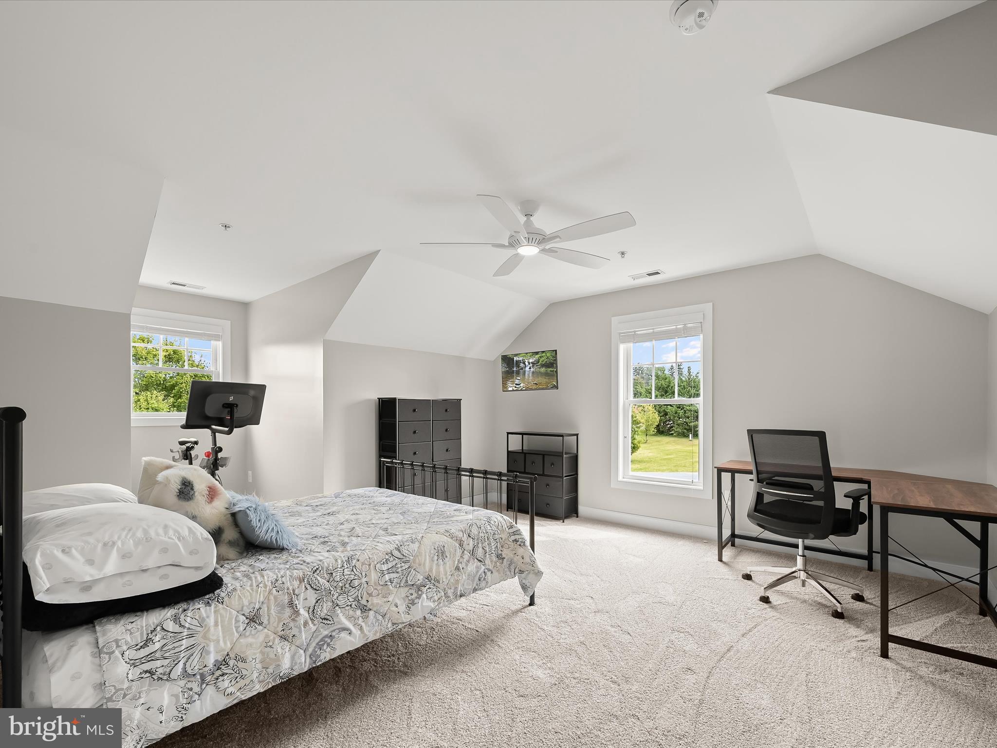 17263 Hardy Road Mount Airy, MD 21771 - Photo 56 of 98 a bedroom with a bed and a fireplace