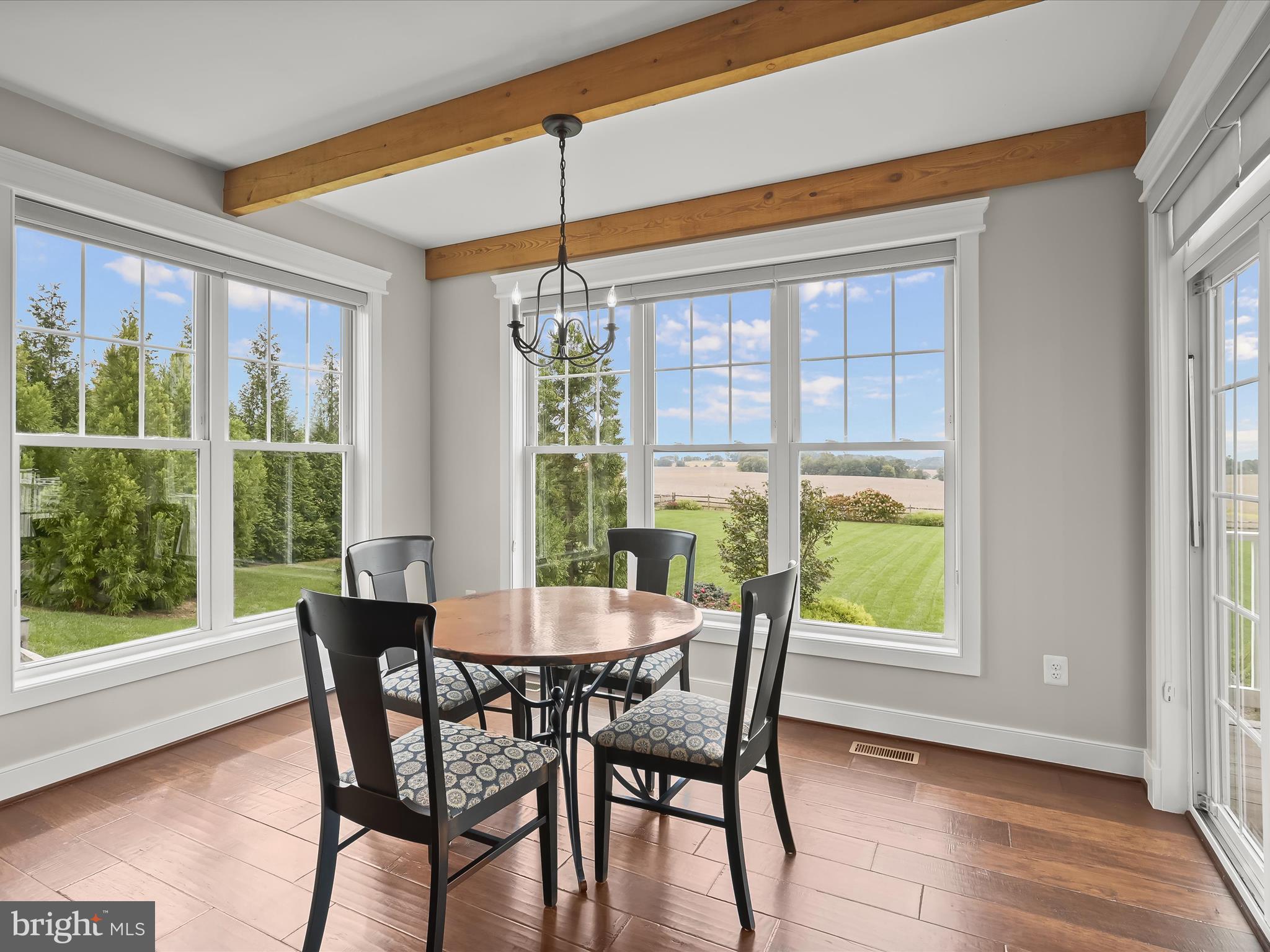 17263 Hardy Road Mount Airy, MD 21771 - Photo 6 of 98 a view of a dining room with furniture and chandelier