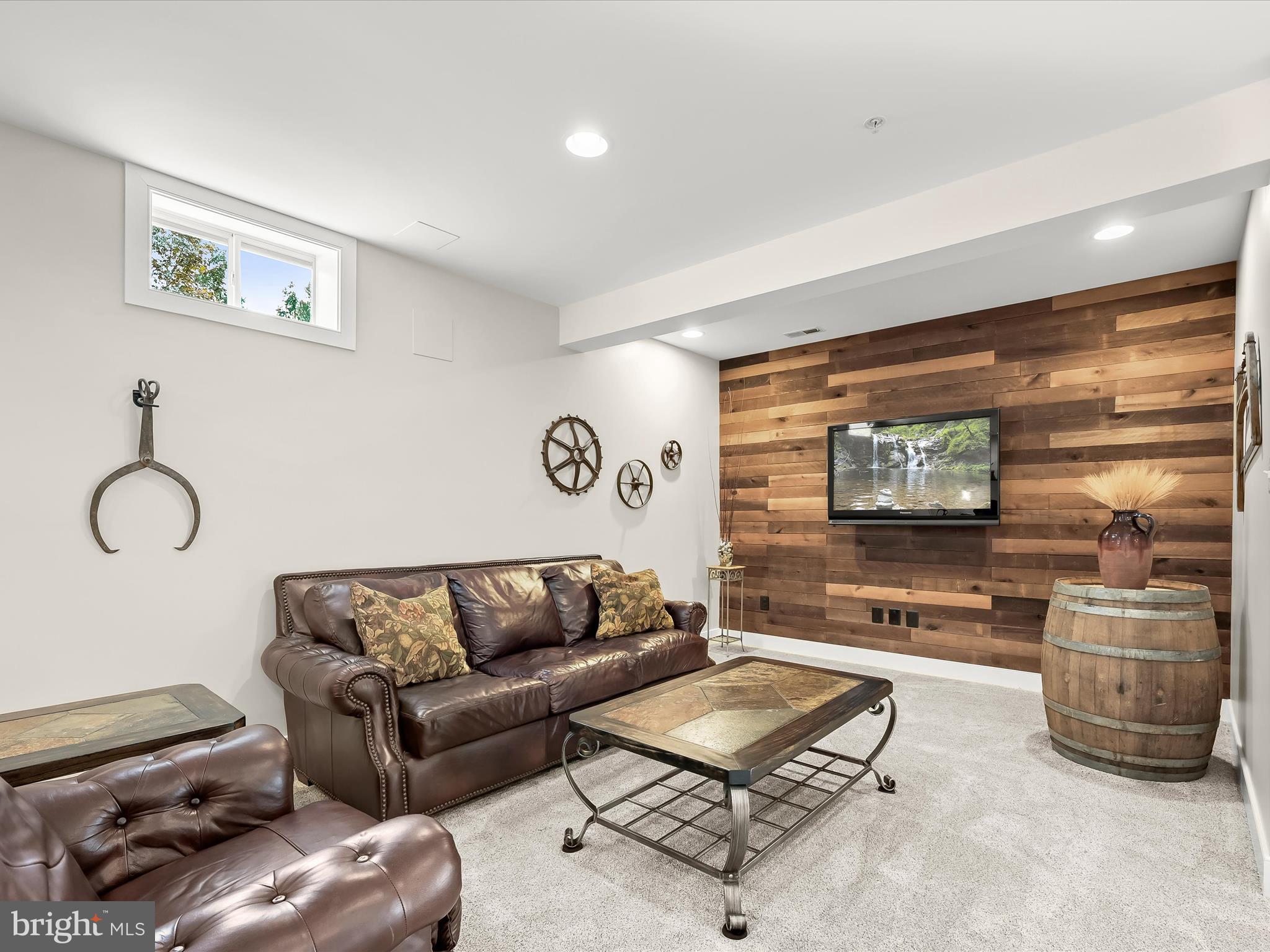 17263 Hardy Road Mount Airy, MD 21771 - Photo 63 of 98 a living room with furniture and a flat screen tv