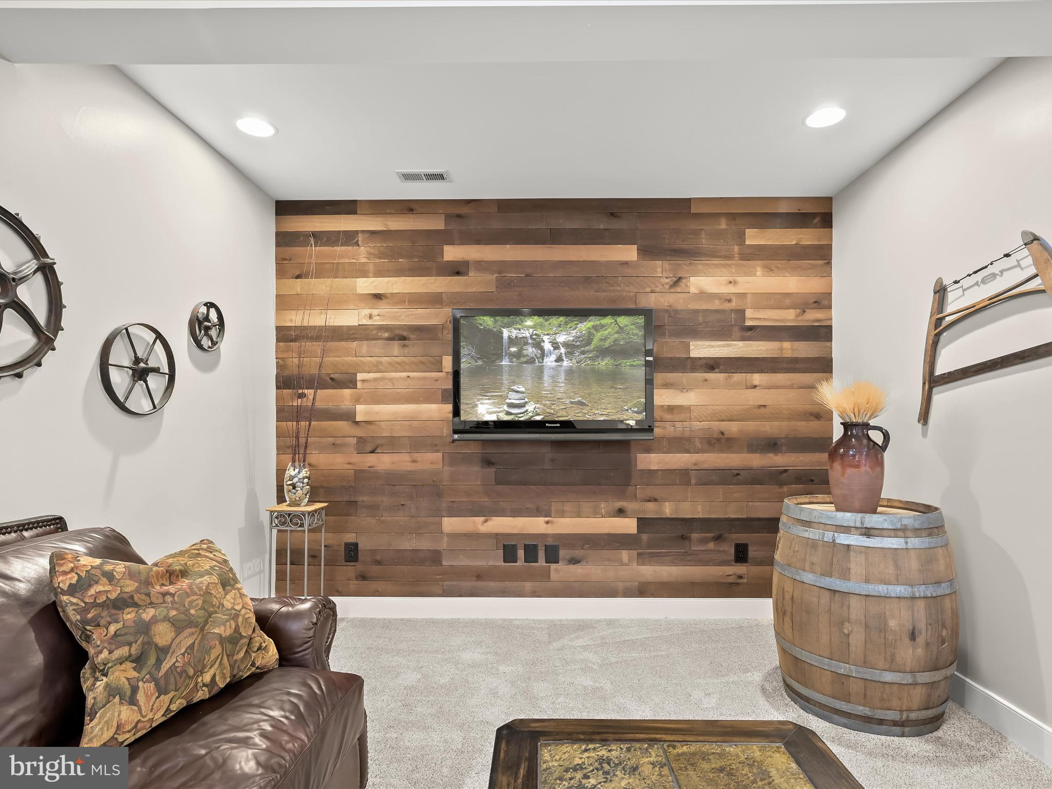 17263 Hardy Road Mount Airy, MD 21771 - Photo 64 of 98 a living room with furniture and a flat screen tv
