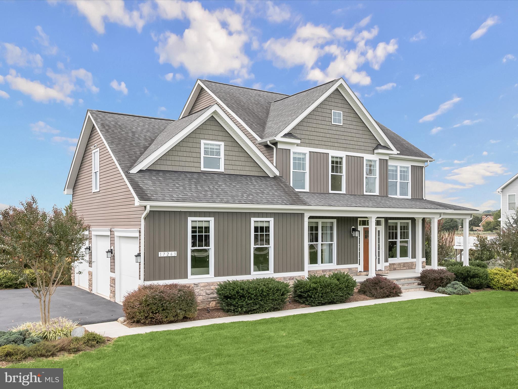17263 Hardy Road Mount Airy, MD 21771 - Photo 72 of 98 a front view of a house with a yard and garage