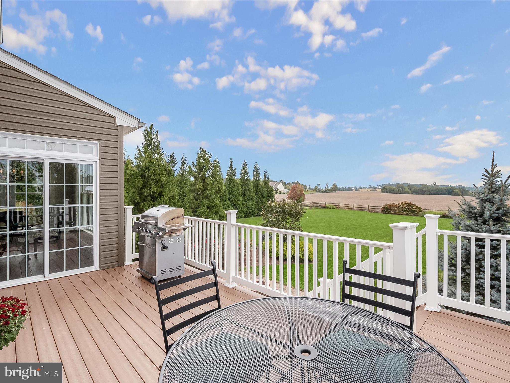 17263 Hardy Road Mount Airy, MD 21771 - Photo 77 of 98 a view of a roof deck with couches and wooden floor