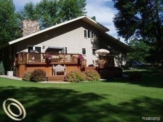7860 Thomas Road Unionville, MI 48767 - Photo 2 of 18 7860 BACK DECK.jpg